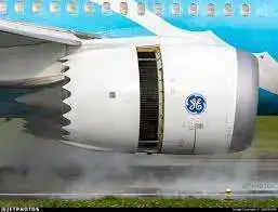 GE engine nacelle on Boeing 787 — thrust reverser cowl assembly visible with GE badge