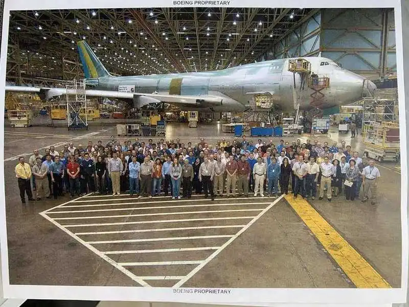 Boeing 747-8 full design and analysis team assembled in front of aircraft on the Everett factory floor — BOEING PROPRIETARY