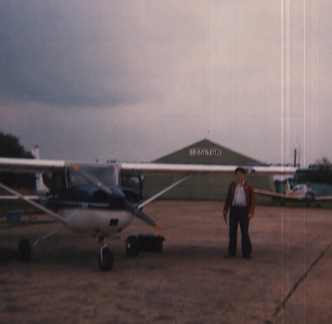 Steve standing on the apron beside his Cessna 150H at Cambridge UK