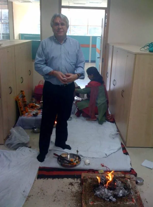 Opening puja blessing ceremony at the new Chandigarh design and stress analysis office, led by the chief engineer with a sacred fire and offerings
